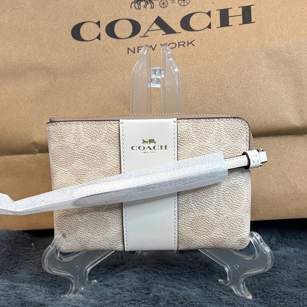 Coach Cream and Tan corner leather monogram Wristlet nwt!